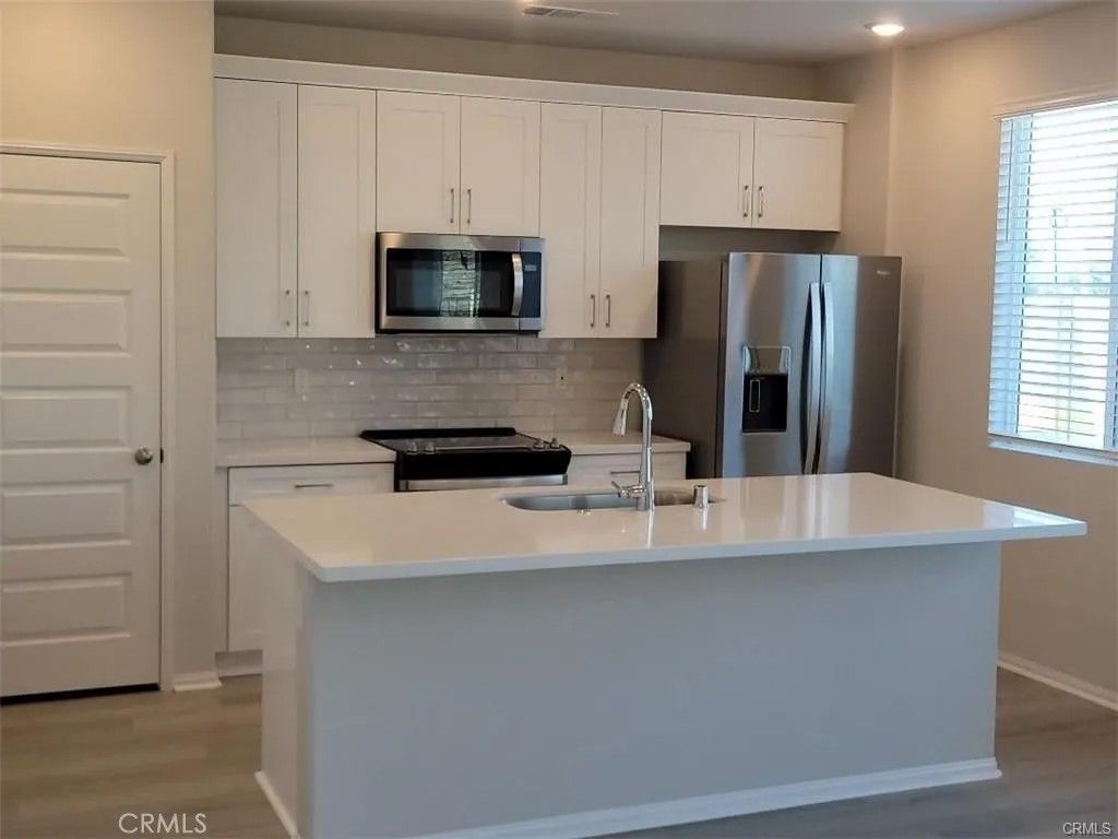 Photo of 2058 Bergamot St, Redlands, CA 92374 (MLS # OC25266091)