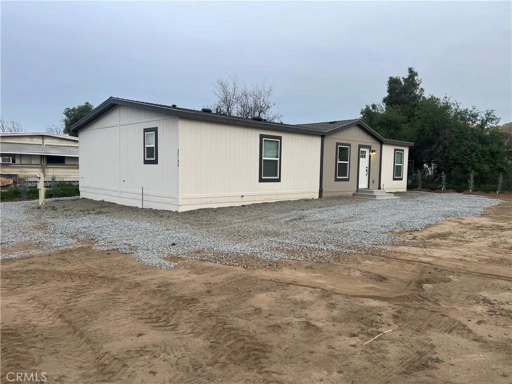 Photo of 32100 Sweetwater Lane, Homeland, CA 92548 (MLS # TR26031275)