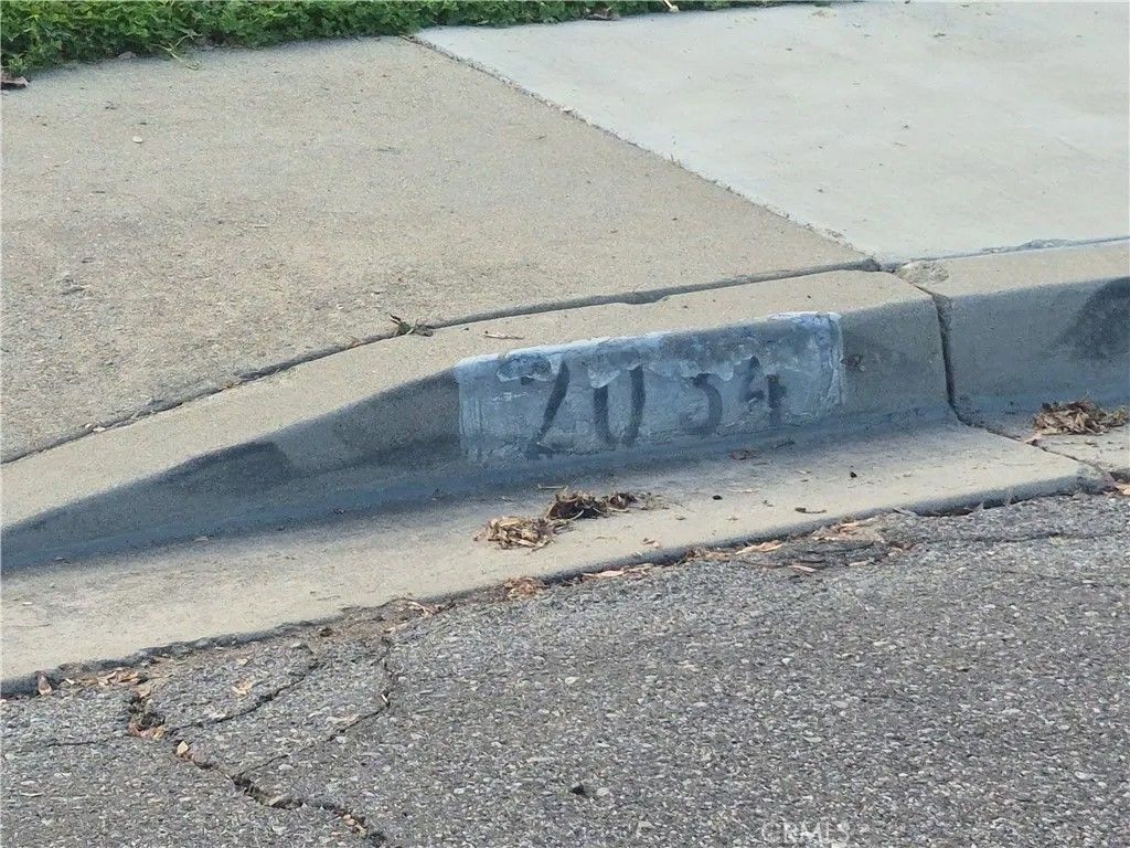 Photo of 2034 Stoddard Pl, Pomona, CA 91768 (MLS # DW26013158)