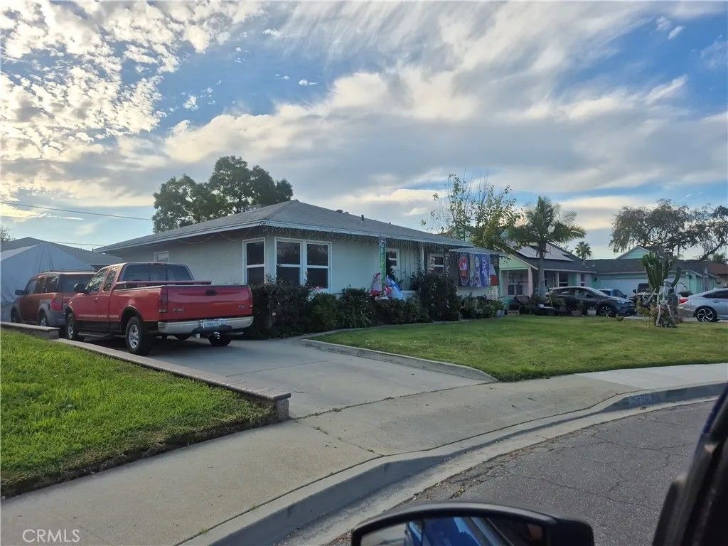 Photo of 2034 Stoddard Pl, Pomona, CA 91768 (MLS # DW26013158)