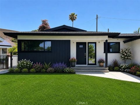 Photo of 1814 N Studebaker RD, Long Beach, CA 90815 (MLS # RS26115089)