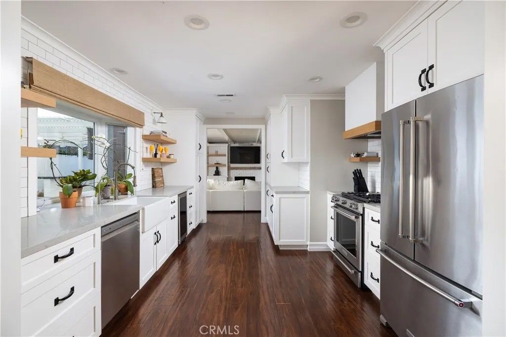 Photo of 407 E 16th Place, Costa Mesa, CA 92627 (MLS # NP26016595)