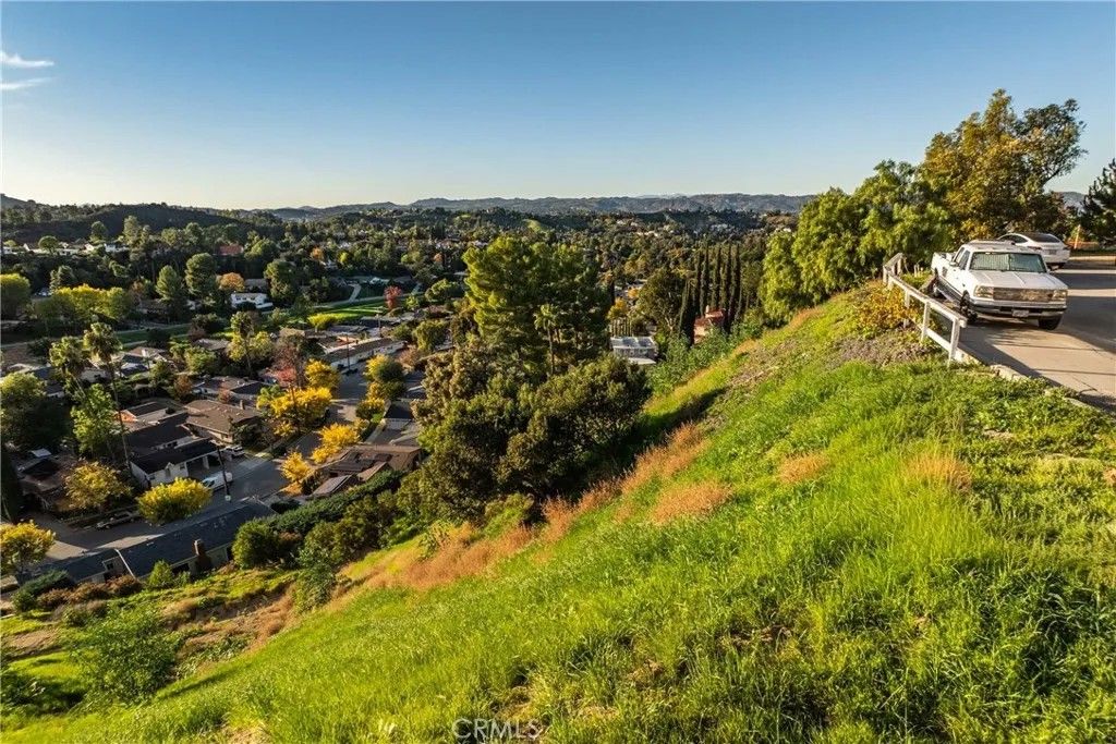 Photo of 34 Torreon, Woodland Hills, CA 91364 (MLS # SR25276274)