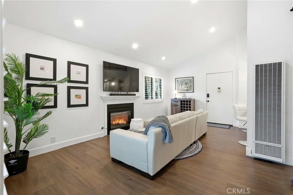 Photo of 19222 Shoreline Ln #7, Huntington Beach, CA 92648 (MLS # OC26002604)