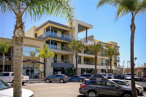 Photo of 414 Main St #310, Huntington Beach, CA 92648 (MLS # OC25258877)