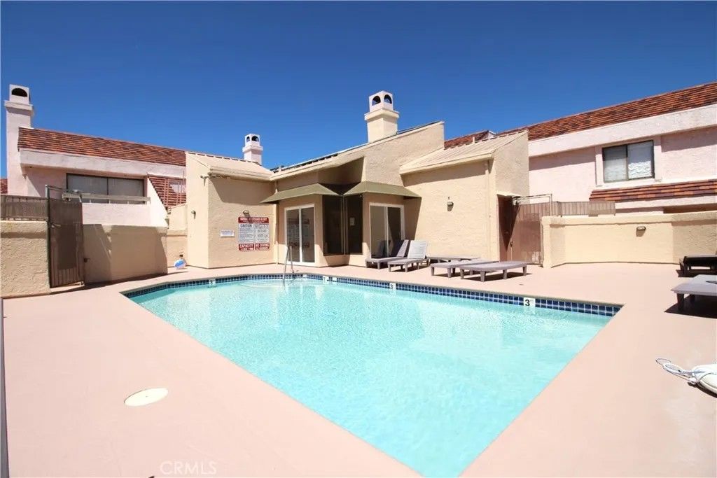 Photo of 9906 Owensmouth Ave #12, Chatsworth, CA 91311 (MLS # RS26063858)