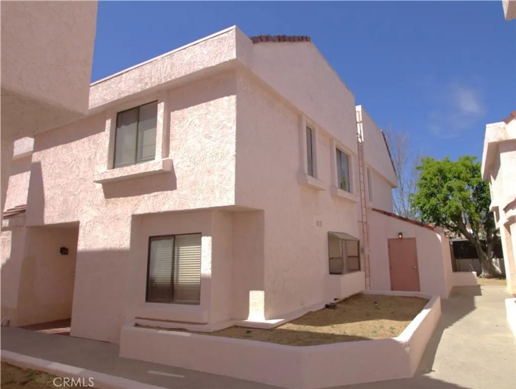 Photo of 9906 Owensmouth Ave #12, Chatsworth, CA 91311 (MLS # RS26063858)