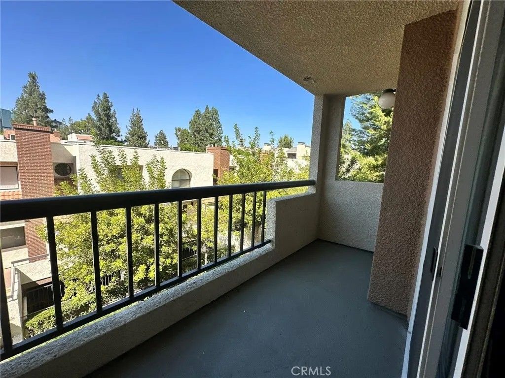 Photo of 5550 Owensmouth Ave #217, Woodland Hills, CA 91367 (MLS # SB25251033)