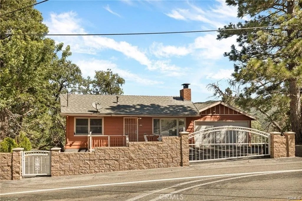 Photo of 30400 Live Oak DR, Running Springs, CA 92382 (MLS # IG26113666)
