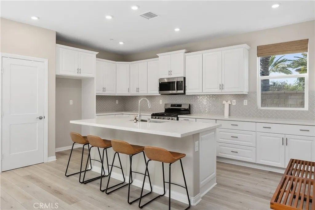 Photo of 1603 Laurelwood Way, Oceanside, CA 92056 (MLS # OC26029455)