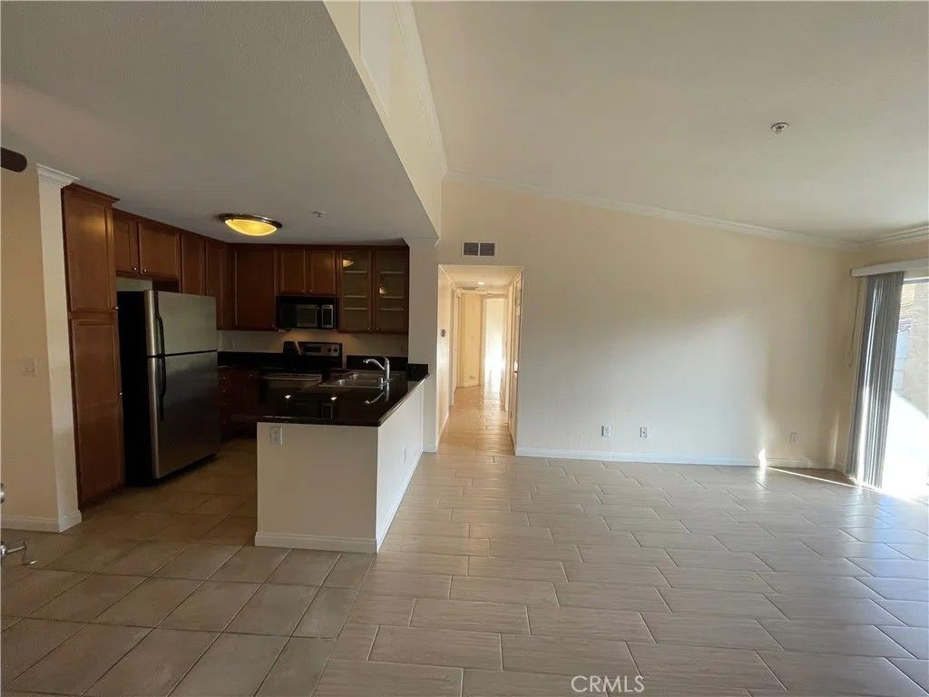 Photo of 1965 Las Colinas Circle #308, Corona, CA 92879 (MLS # IG25280364)