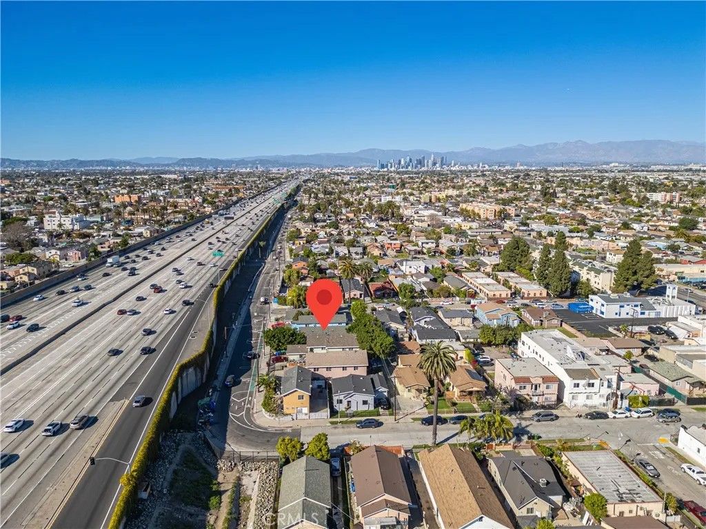 Photo of 8410 S Grand Ave, Los Angeles, CA 90003 (MLS # SR26058221)