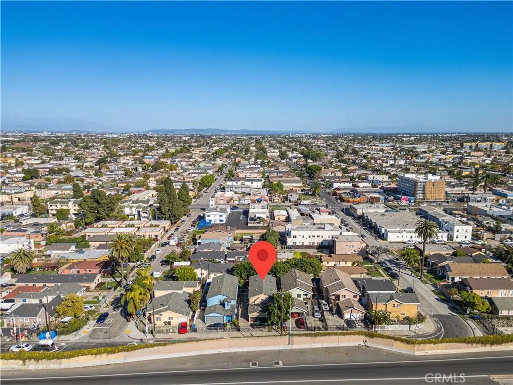 Photo of 8410 S Grand Ave, Los Angeles, CA 90003 (MLS # SR26058221)