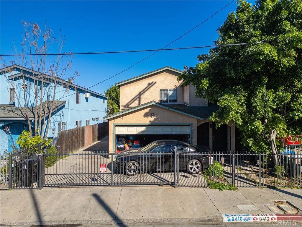 Photo of 8410 S Grand Ave, Los Angeles, CA 90003 (MLS # SR26058221)