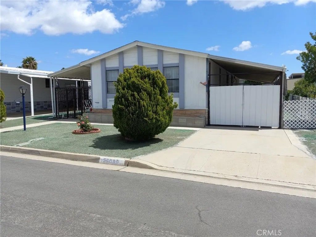 Photo of 26090 Ivory Palm Drive, Homeland, CA 92548 (MLS # IV26003650)