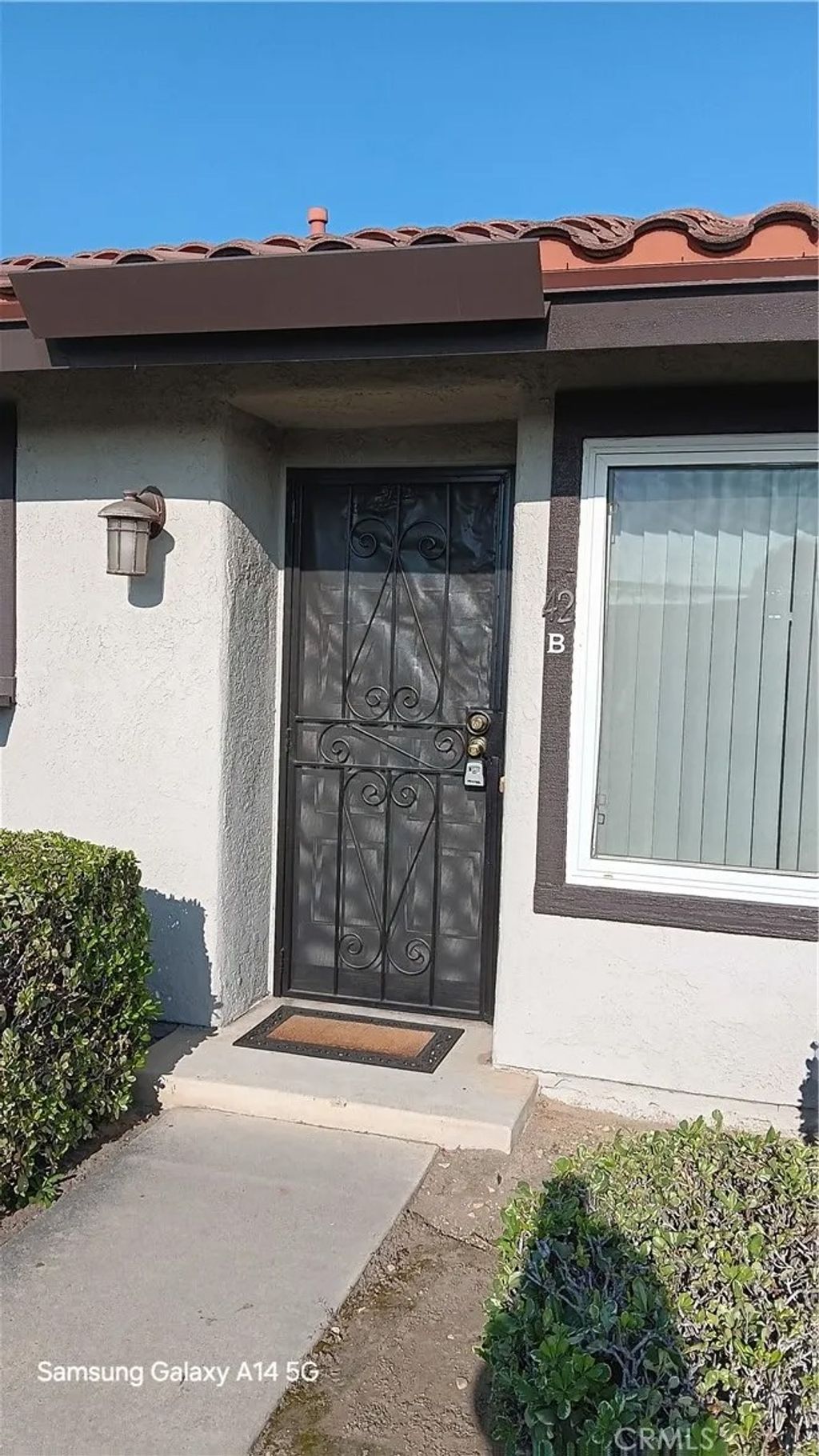 Photo of 10415 Hayford Street #B, Bellflower, CA 90706 (MLS # RS25279161)