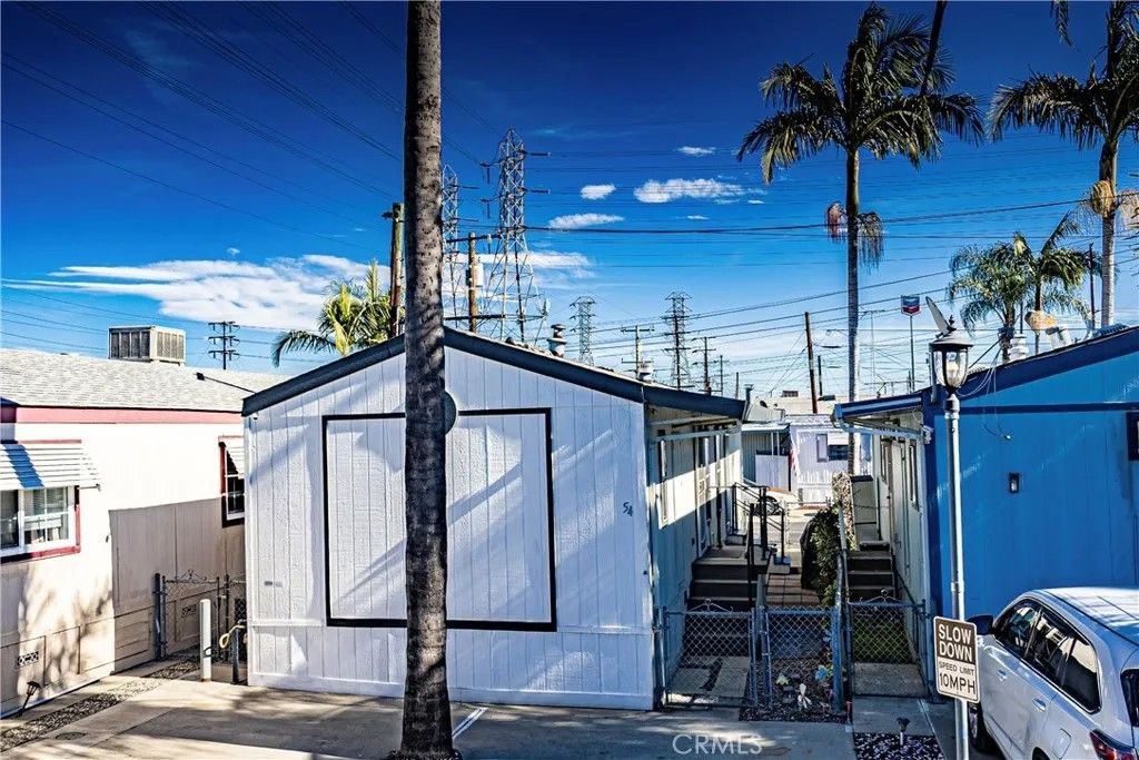 Photo of 8811 Park St #54, Bellflower, CA 90706 (MLS # PW26007145)