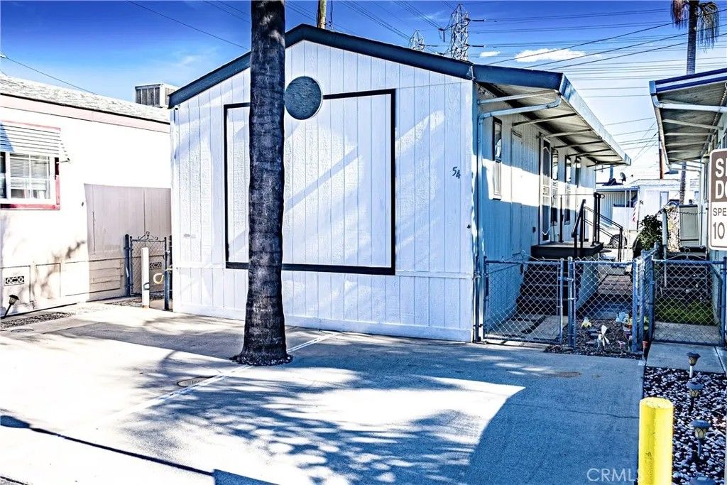 Photo of 8811 Park St #54, Bellflower, CA 90706 (MLS # PW26007145)