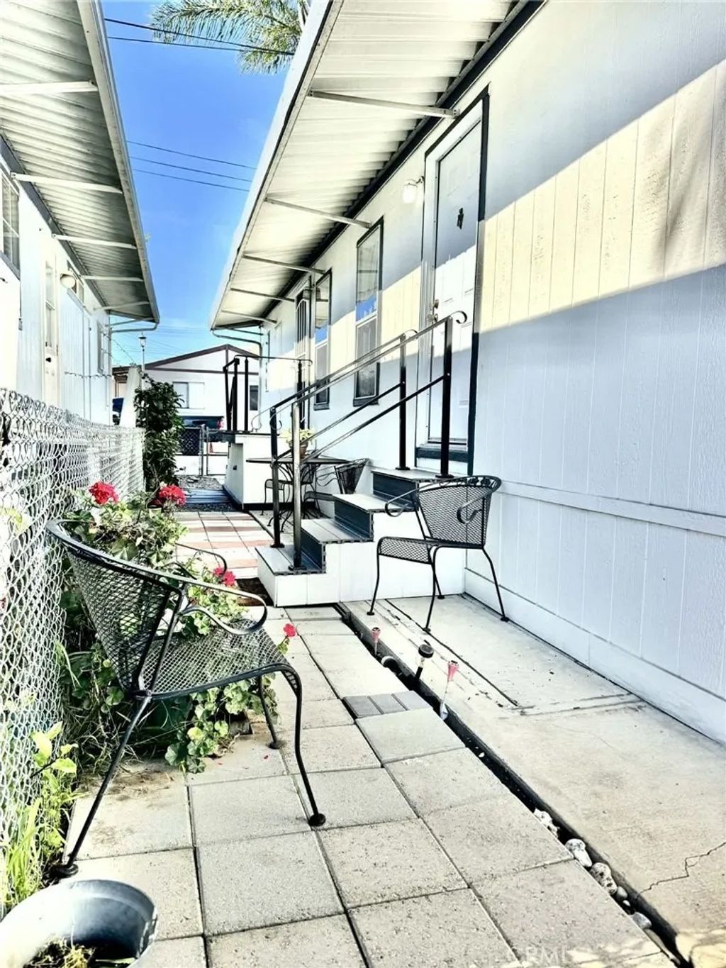 Photo of 8811 Park St #54, Bellflower, CA 90706 (MLS # PW26007145)
