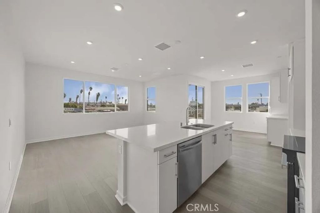 Photo of 107 S. Laxore St #408, Anaheim, CA 92804 (MLS # OC26014304)