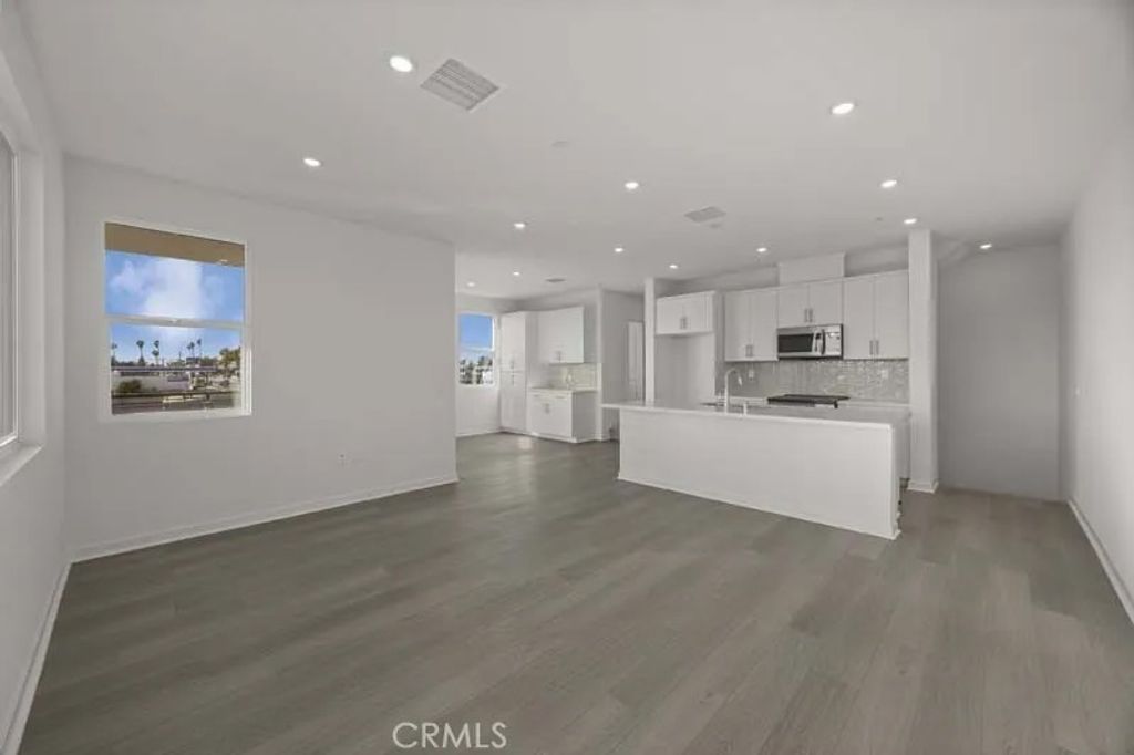 Photo of 107 S. Laxore St #408, Anaheim, CA 92804 (MLS # OC26014304)