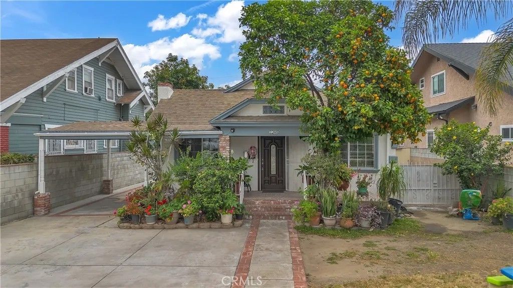 Photo of 1248 W Martin Luther King Jr Blvd, Los Angeles, CA 90037 (MLS # DW26102400)