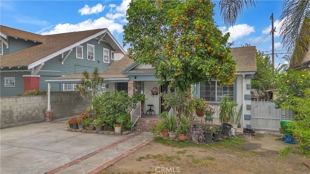 Photo of 1248 W Martin Luther King Jr Blvd, Los Angeles, CA 90037 (MLS # DW26102400)