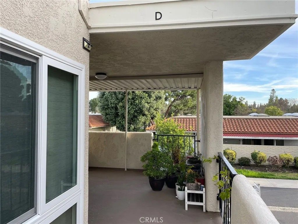 Photo of 2192 E Via Mariposa #D, Laguna Woods, CA 92637 (MLS # OC25270447)