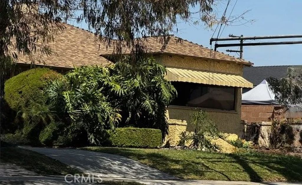 Photo of 10815 S Hoover ST, Los Angeles, CA 90044 (MLS # PW26102948)