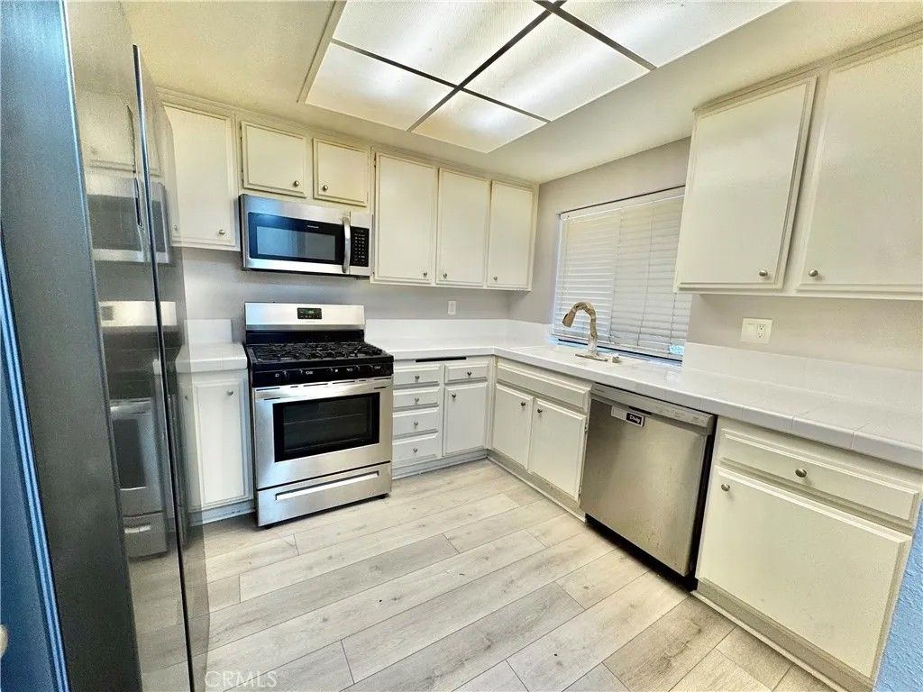 Photo of 2504 E Willow St #107, Signal Hill, CA 90755 (MLS # SB26041133)