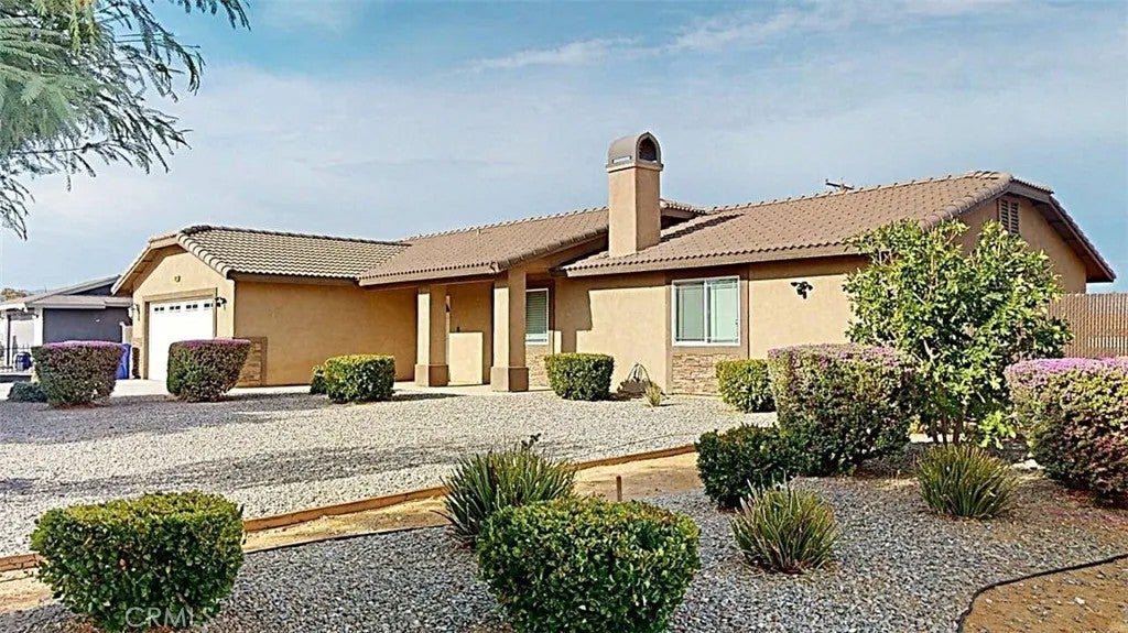 Photo of 10882 Malgosa RD, Apple Valley, CA 92308 (MLS # HD26192354)