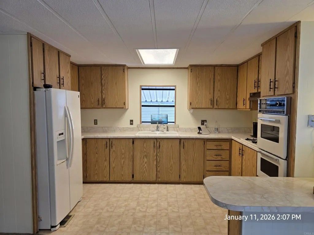 Photo of 8712 N Magnolia Ave #SPC 65, Santee, CA 92071 (MLS # NDP2600139)