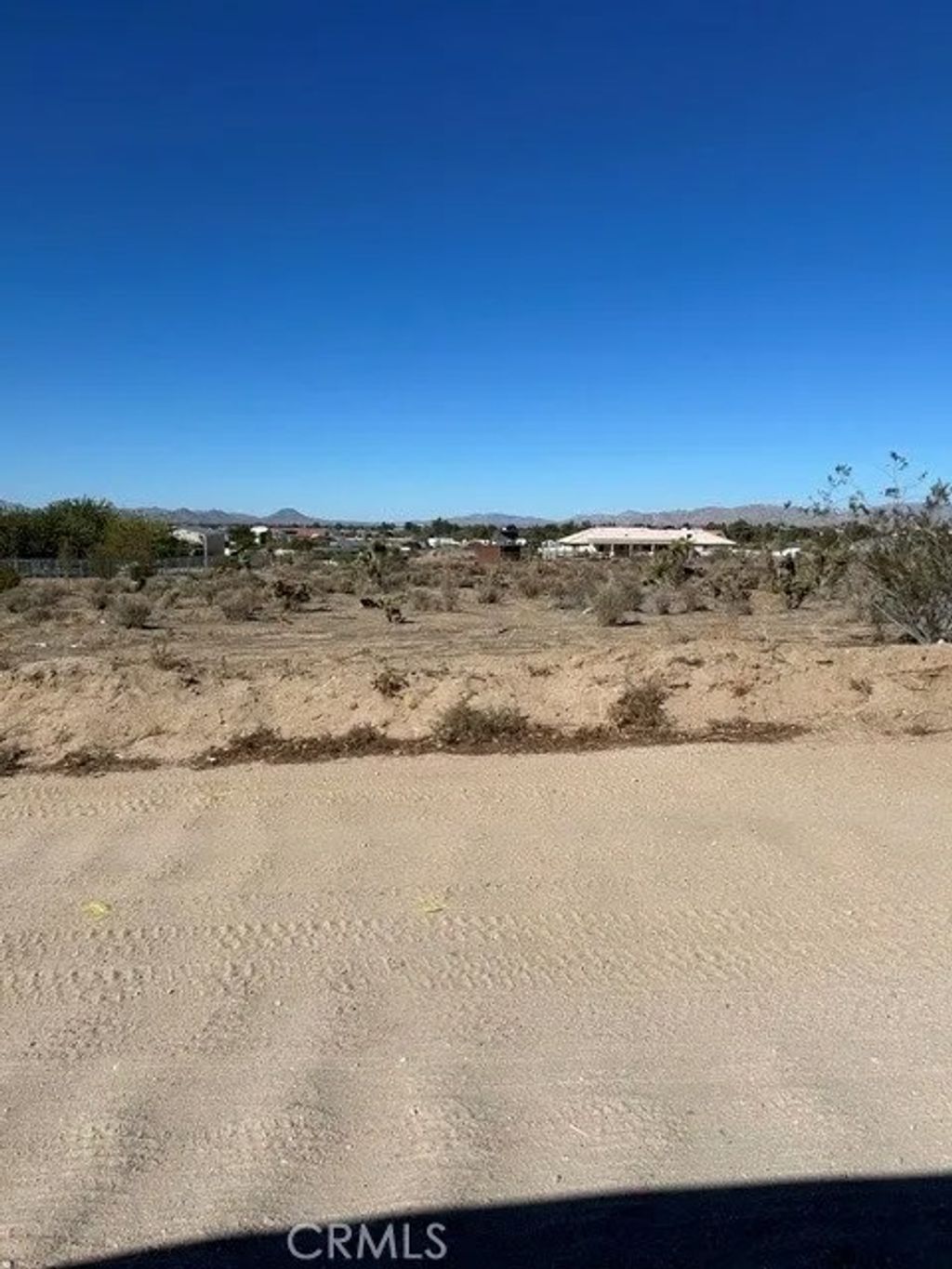 Photo of 21866 Ocotillo, Apple Valley, CA 92308 (MLS # HD26109860)