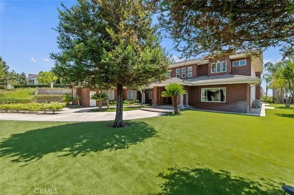 Photo of 6975 Wyndham Hill Drive, Riverside, CA 92506 (MLS # IG26023577)