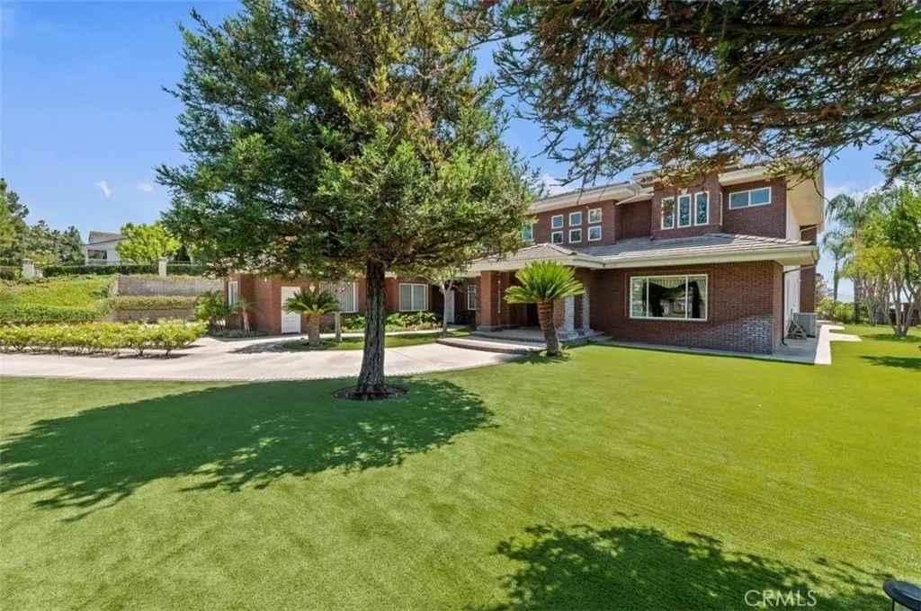 Photo of 6975 Wyndham Hill Drive, Riverside, CA 92506 (MLS # IG26023577)