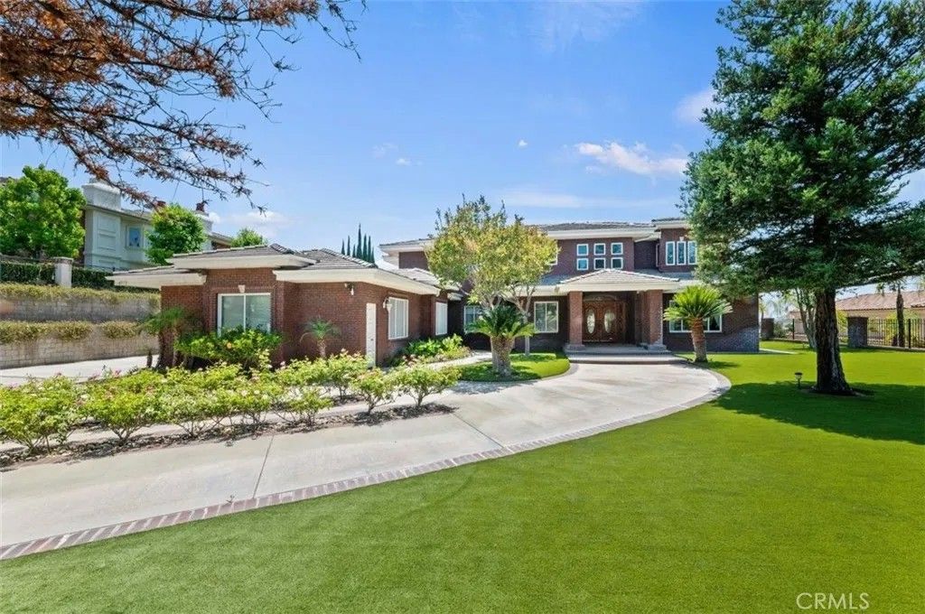 Photo of 6975 Wyndham Hill Drive, Riverside, CA 92506 (MLS # IG26023577)