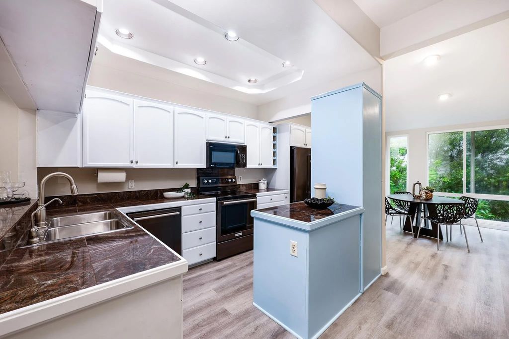 Photo of 2406 Altisma Way #A, Carlsbad, CA 92009 (MLS # 260007603)