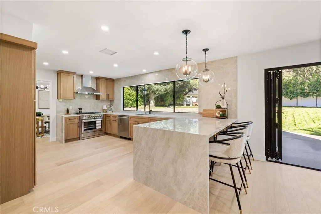 Photo of 5340 Edgeware Drive, Calabasas, CA 91301 (MLS # SR25272916)