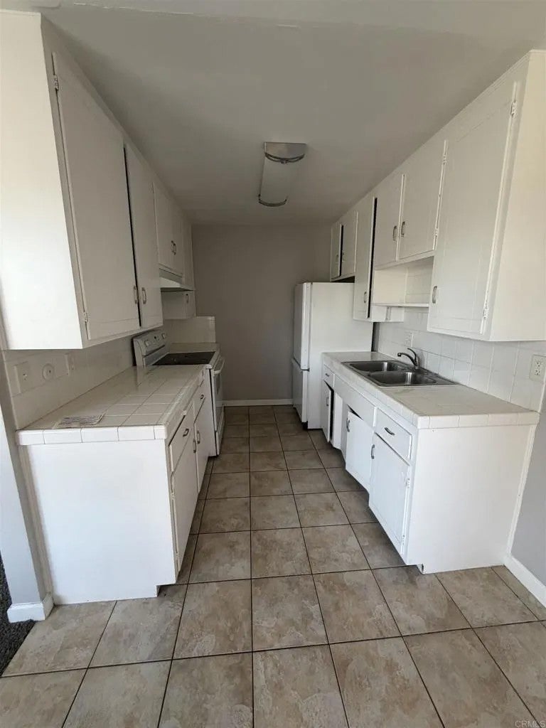 Photo of 285 Moss Street #103, Chula Vista, CA 91911 (MLS # PTP2607289)