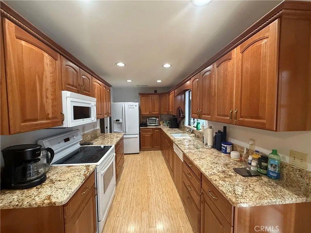 Photo of 1854 Cougar Lane, Clovis, CA 93611 (MLS # GD26069057)