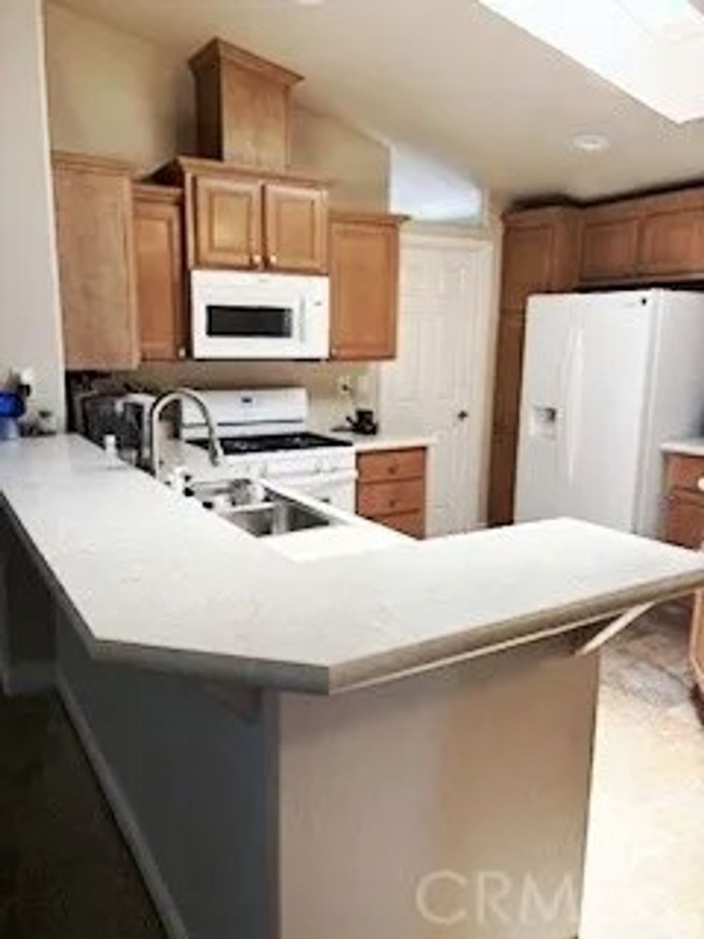 Photo of 24922 Muirlands Blvd #115, Lake Forest, CA 92630 (MLS # OC25248197)