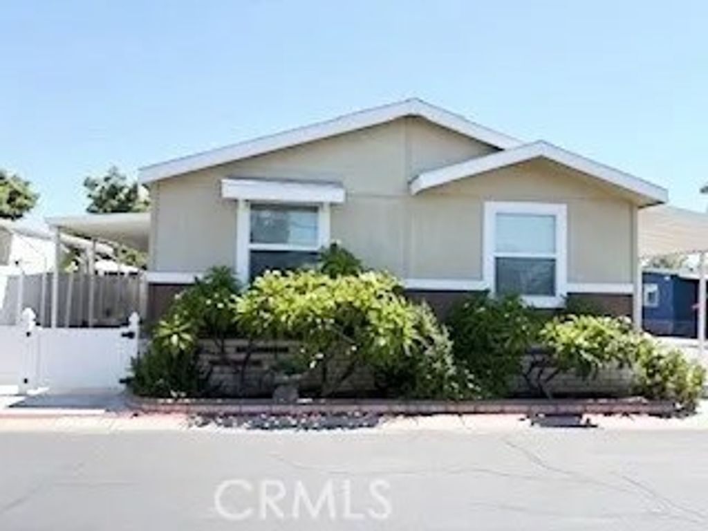 Photo of 24922 Muirlands Blvd #115, Lake Forest, CA 92630 (MLS # OC25248197)