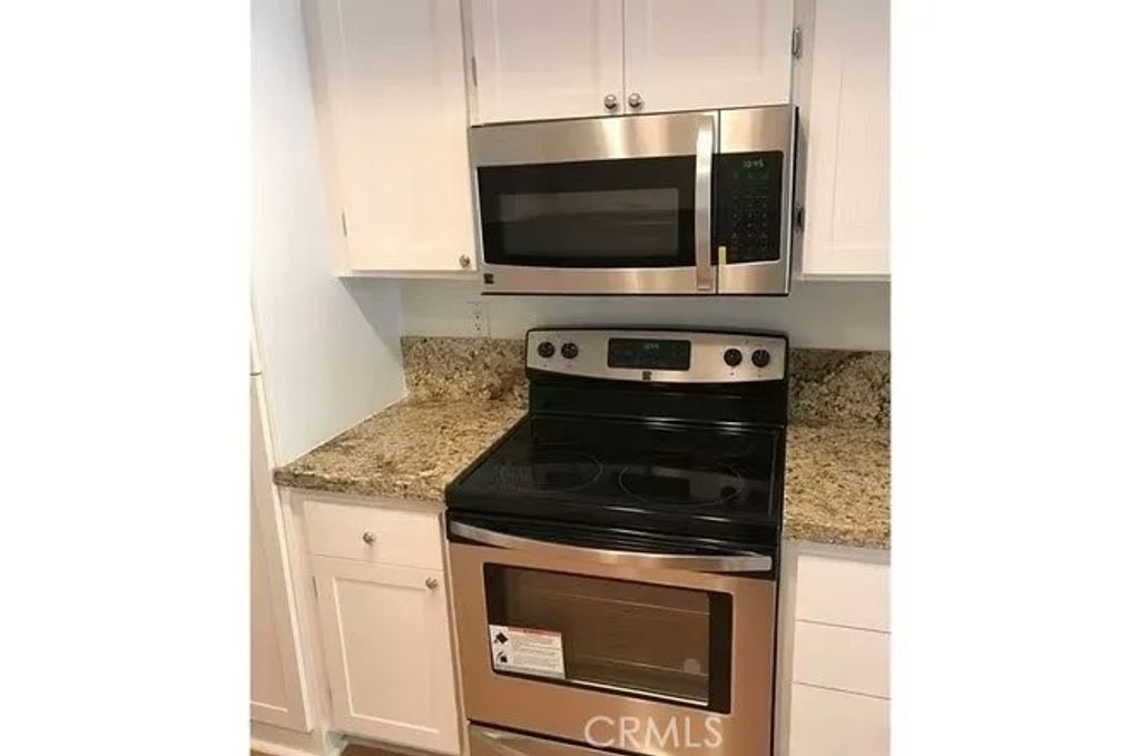 Photo of 108 Stanford Court, Irvine, CA 92612 (MLS # OC26047218)