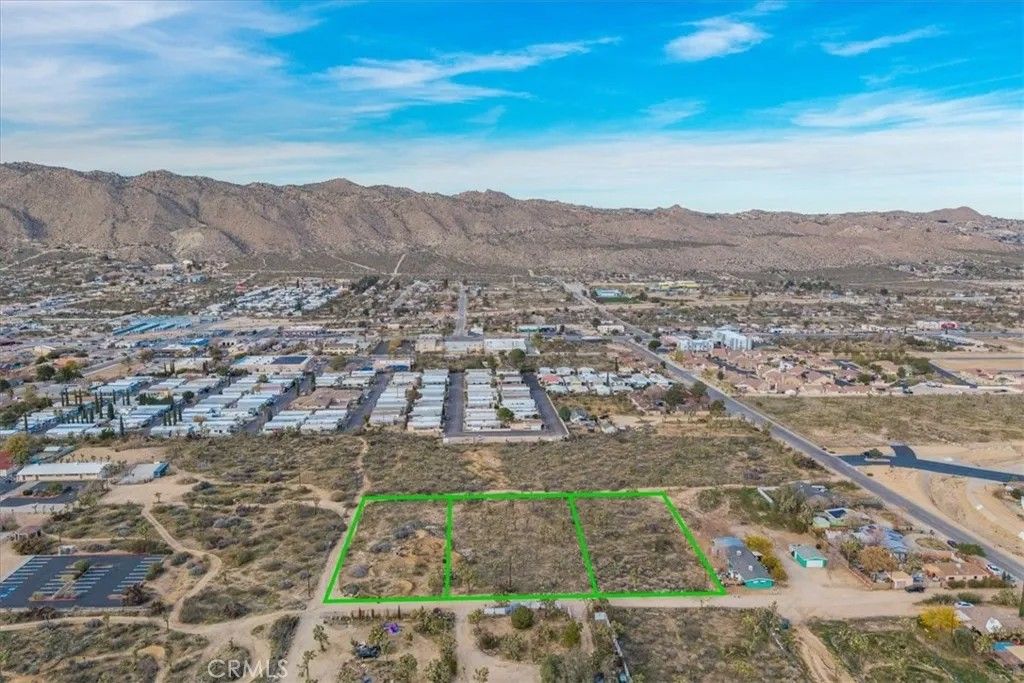 Photo of 8129 Stardust, Yucca Valley, CA 92284 (MLS # JT25280207)