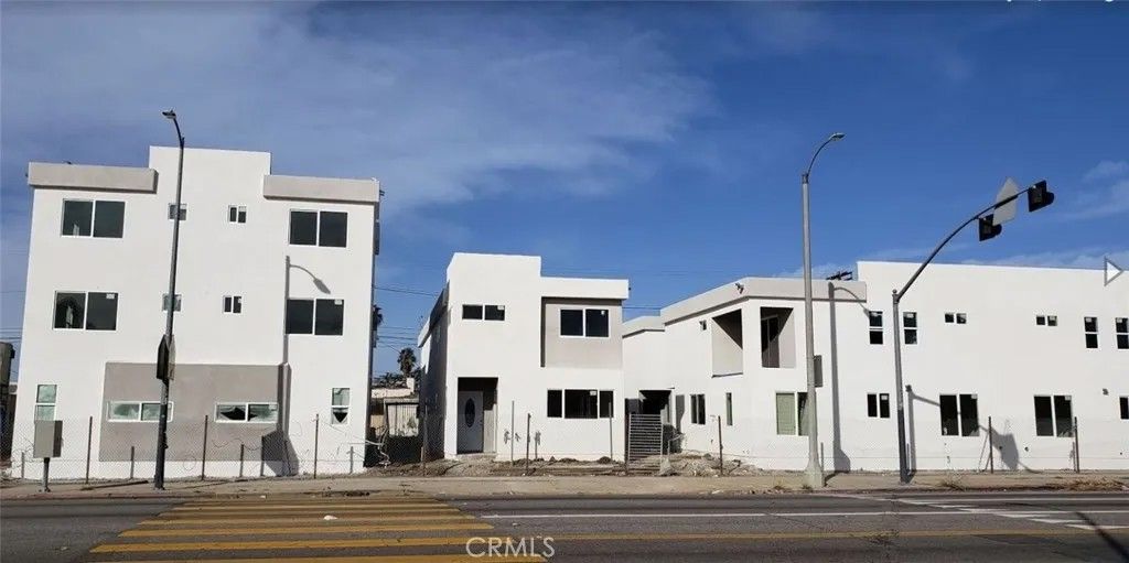 Photo of 2051 W Florence Ave, Los Angeles, CA 90047 (MLS # PW26034192)