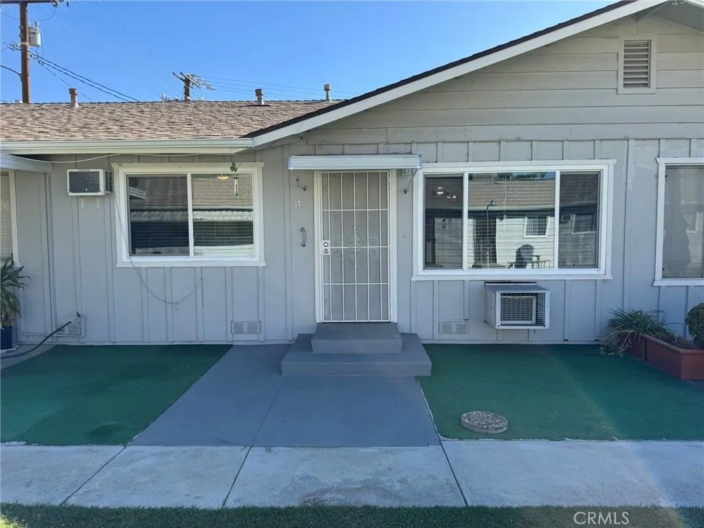Photo of 150 E Lakeshore Drive #14, Lake Elsinore, CA 92530 (MLS # IV25240035)