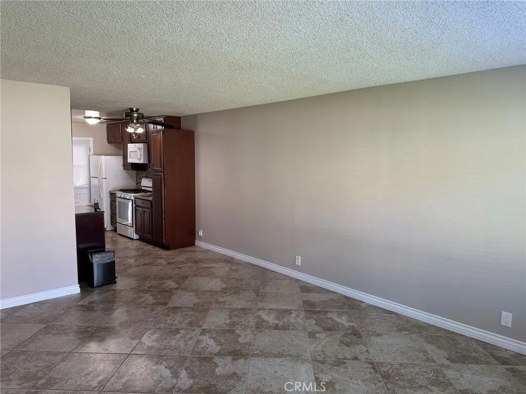 Photo of 150 E Lakeshore Drive #14, Lake Elsinore, CA 92530 (MLS # IV25240035)