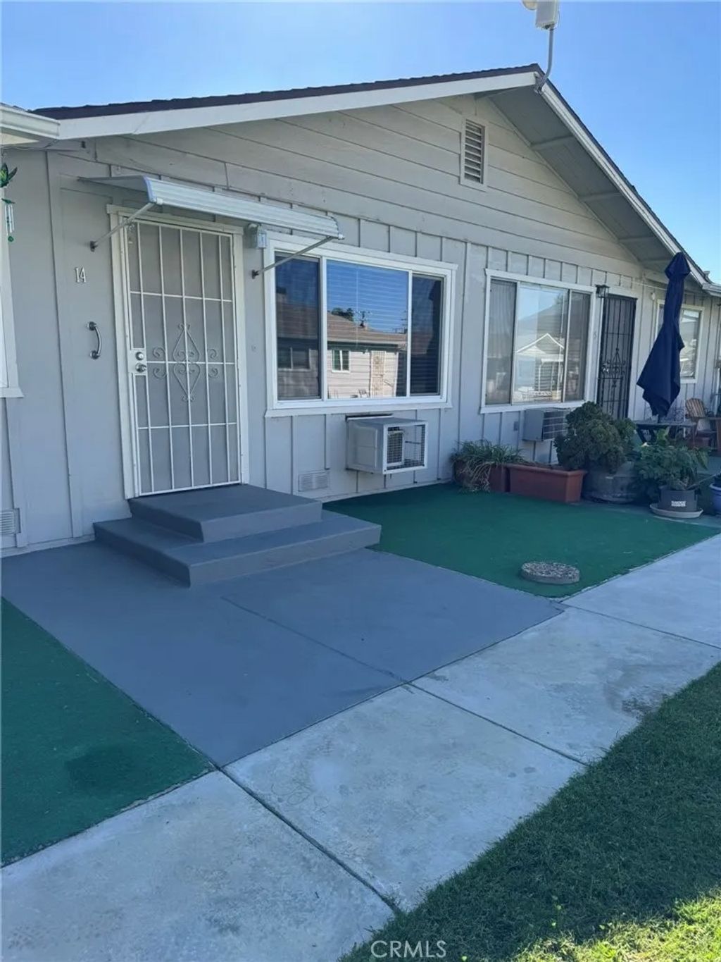 Photo of 150 E Lakeshore Drive #14, Lake Elsinore, CA 92530 (MLS # IV25240035)