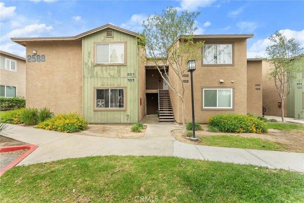 Photo of 2588 Avenida Del Vista #J202, Corona, CA 92882 (MLS # IG26071820)