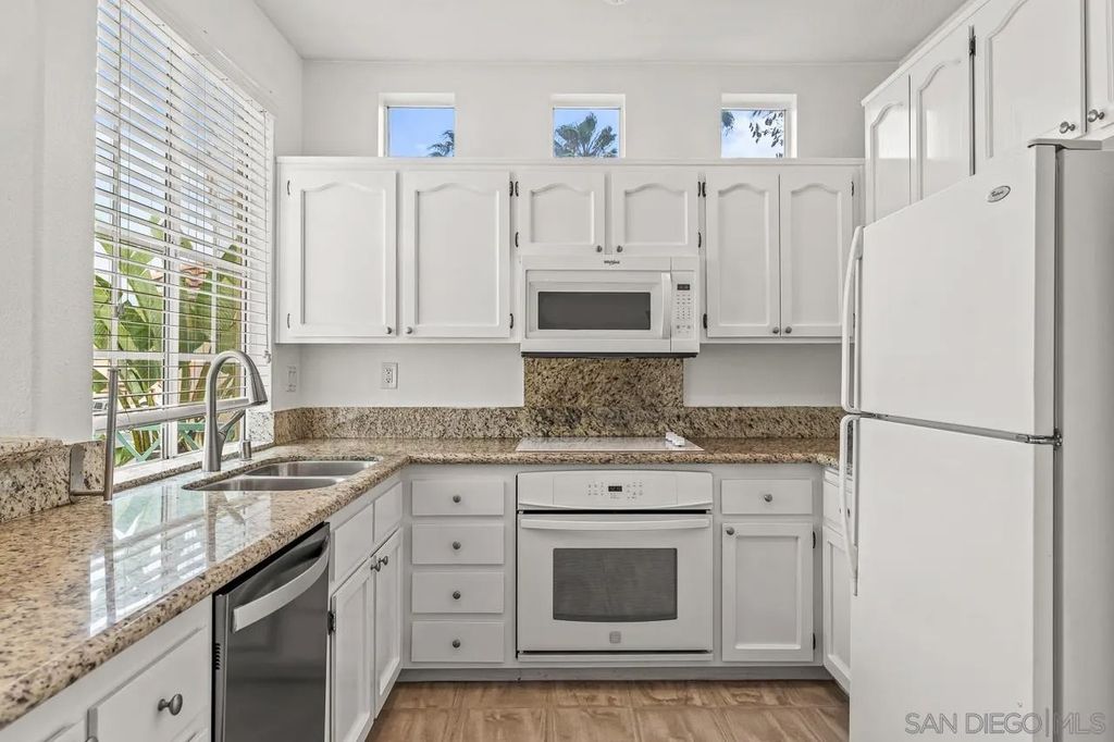 Photo of 12650 Springbrook Dr #A, San Diego, CA 92128 (MLS # 260007854)